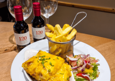 Beef lasagne served with side salad and house fries The Gate Restaurant Navan